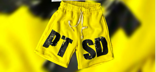 Yellow acidic washed shorts with black bold ptsd print